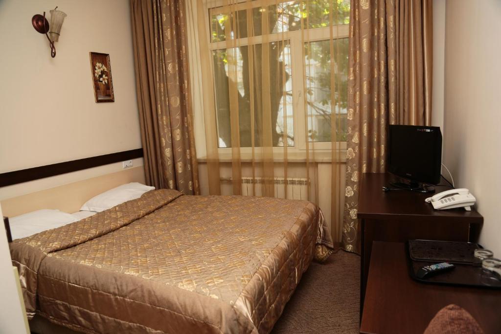 Salem On Tulebaeva Street Hotel Almaty Room photo